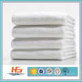 Serviettes blanches de luxe d&#39;hôtel de qualité de coton de 100% pour le spa